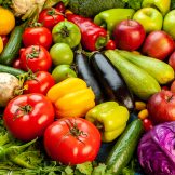 front view vegetable composition with fresh fruits on the blue background color meal healthy life ripe diet salad